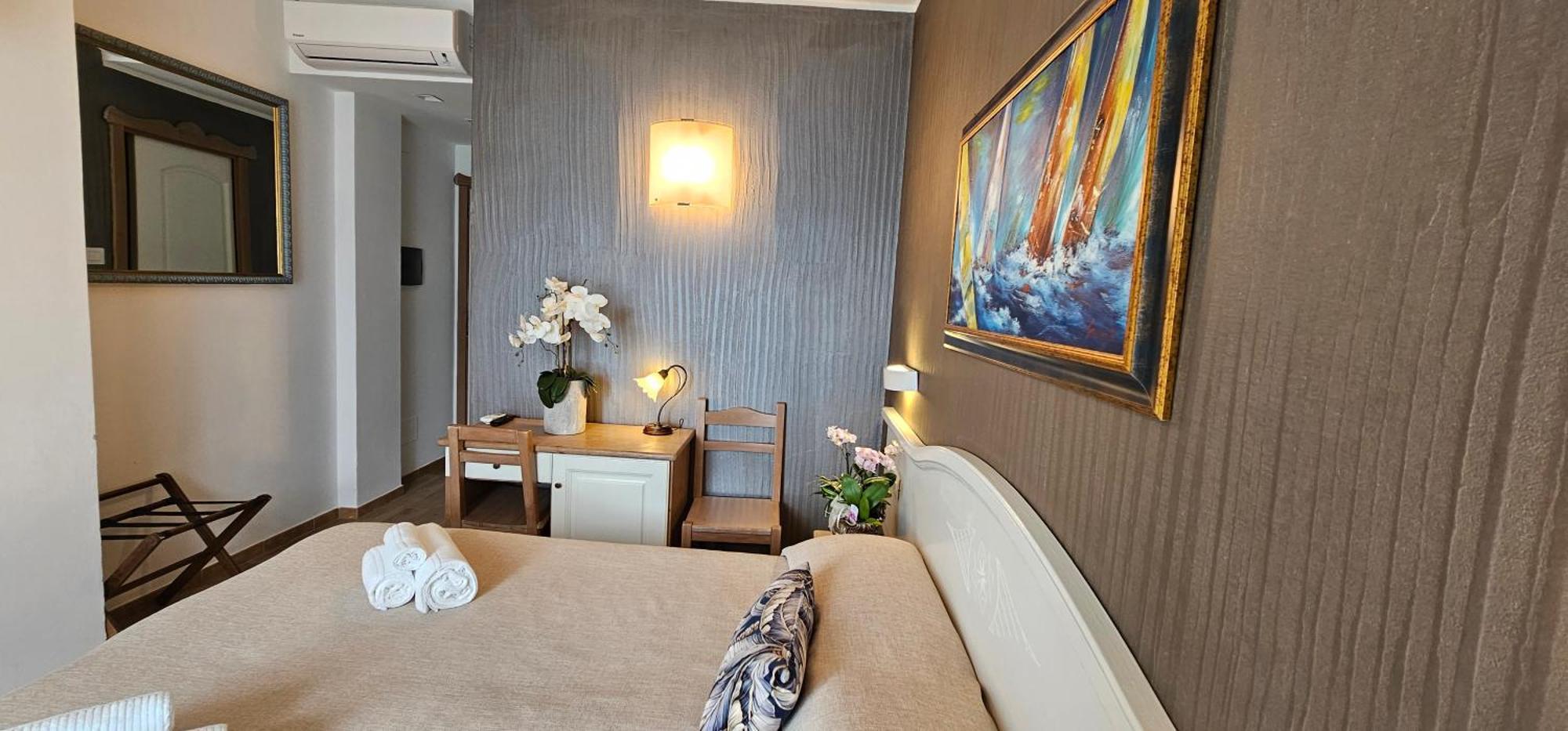 Hotel Meridiana Bellano Quarto foto