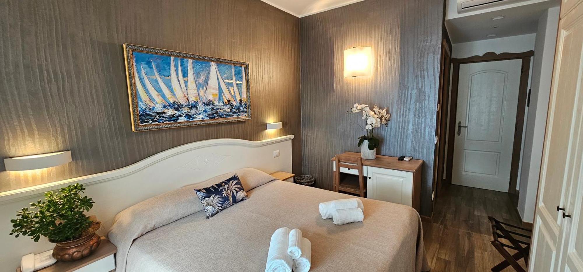 Hotel Meridiana Bellano Quarto foto