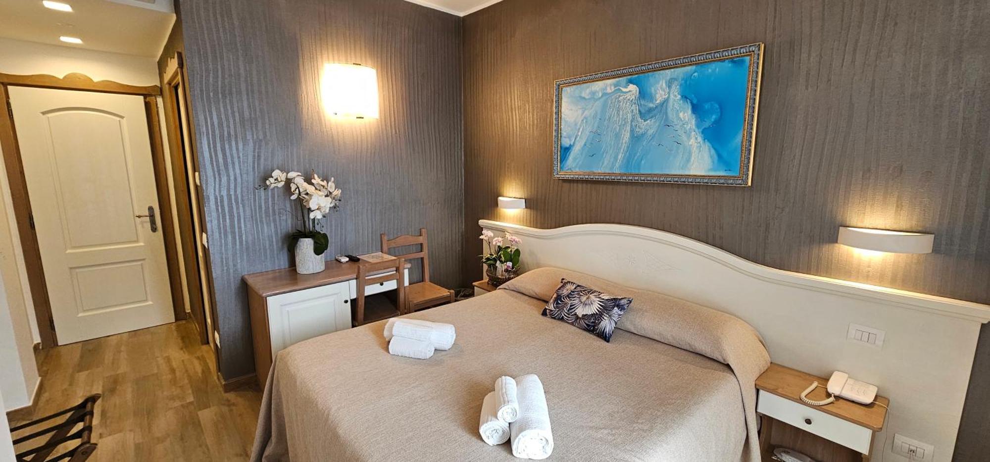 Hotel Meridiana Bellano Quarto foto