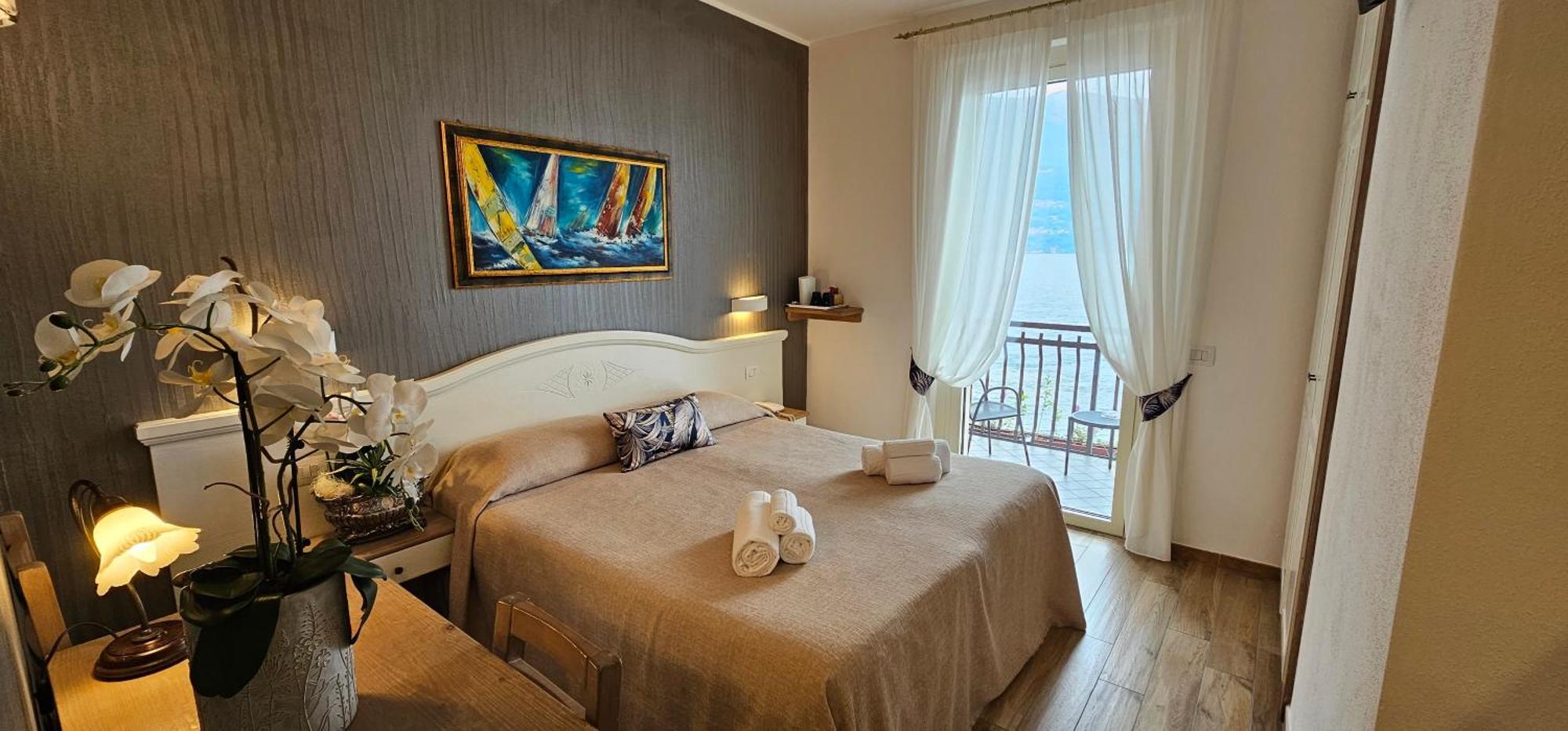 Hotel Meridiana Bellano Quarto foto