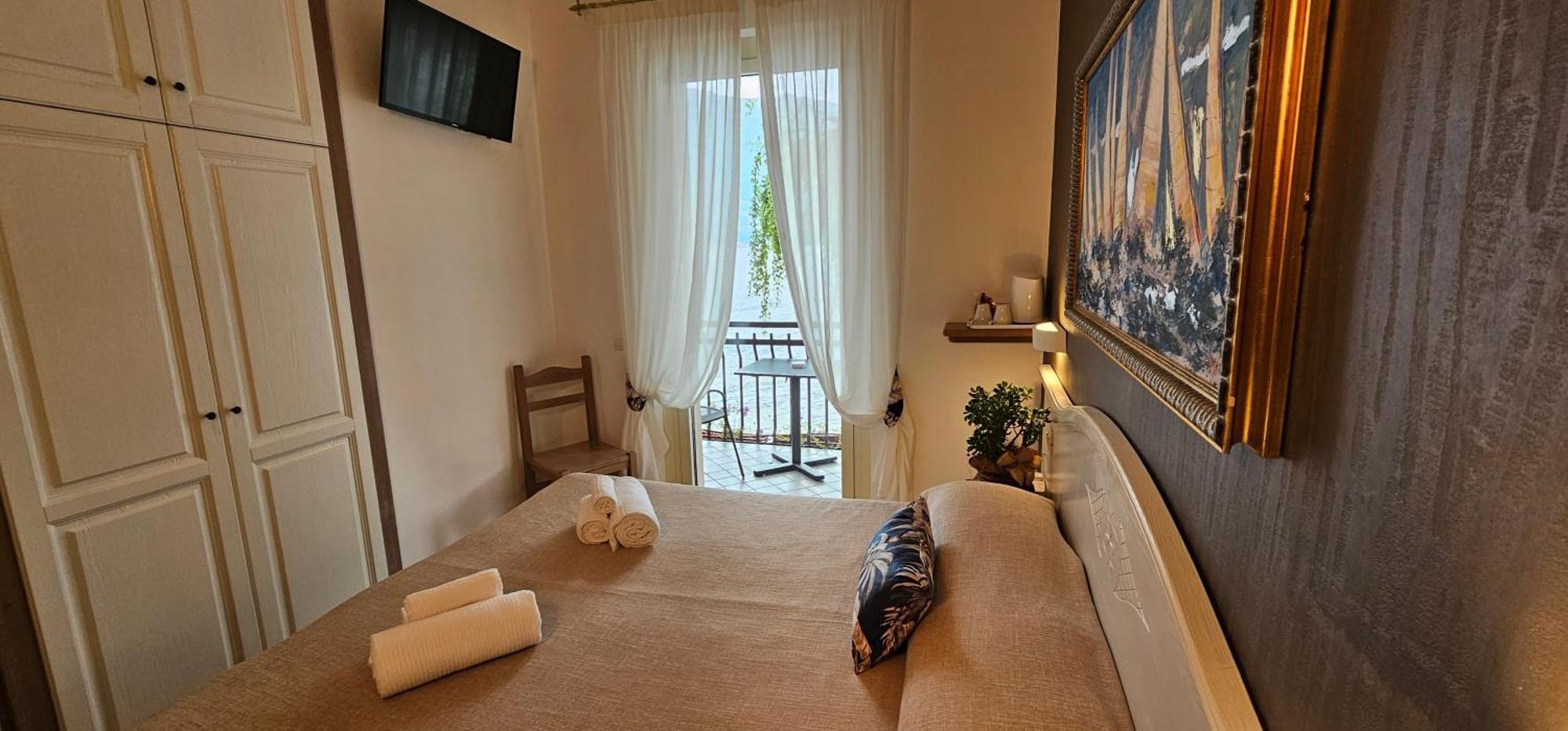 Hotel Meridiana Bellano Quarto foto