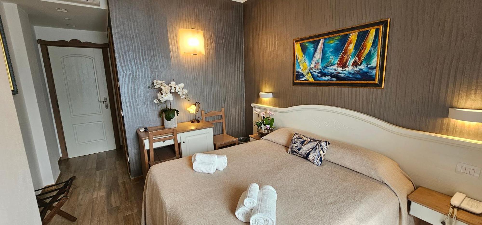 Hotel Meridiana Bellano Quarto foto